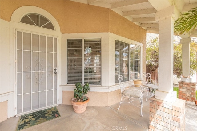 entrance to property with a porch