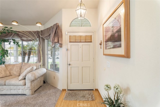 foyer entrance with light wood-type flooring