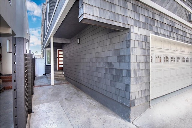 16791 Bayview Dr, Huntington Beach, CA 92649 - view of property exterior featuring a garage