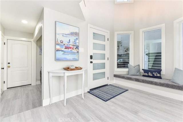 16791 Bayview Dr, Huntington Beach, CA 92649 - foyer with wood finished floors and baseboards