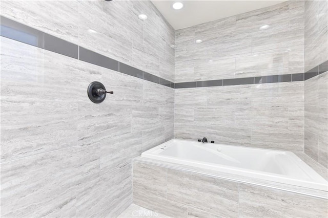 16791 Bayview Dr, Huntington Beach, CA 92649 - full bath with tile walls, a garden tub, and recessed lighting
