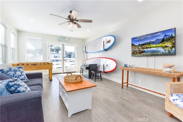 16791 Bayview Dr, Huntington Beach, CA 92649 - living room with wood finished floors, ceiling fan, recessed lighting, and baseboards