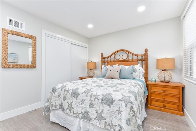 16791 Bayview Dr, Huntington Beach, CA 92649 - bedroom featuring wood finished floors, baseboards, a closet, and recessed lighting