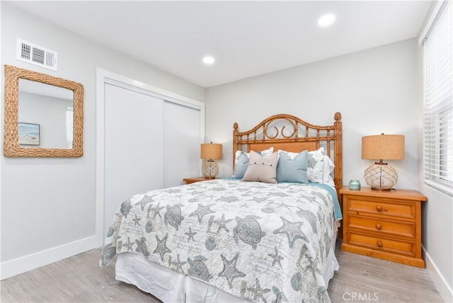 16791 Bayview Dr, Huntington Beach, CA 92649 - bedroom with wood finished floors, a closet, and recessed lighting