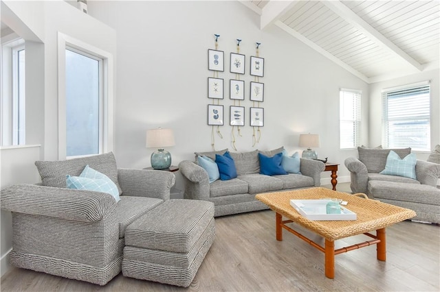 16791 Bayview Dr, Huntington Beach, CA 92649 - living room featuring wood finished floors, beamed ceiling, high vaulted ceiling, and baseboards
