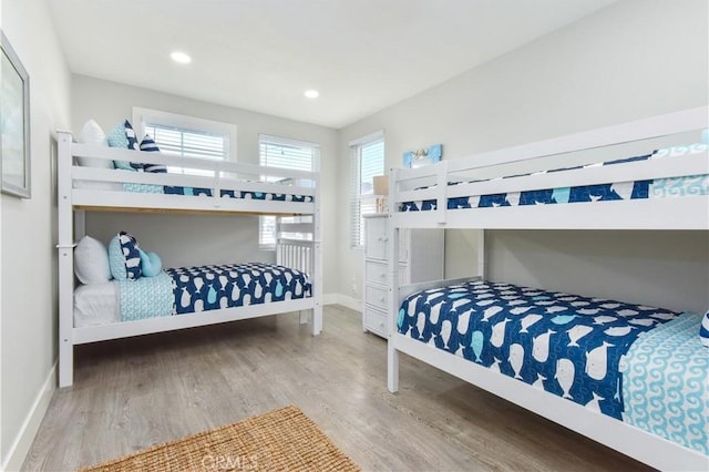 16791 Bayview Dr, Huntington Beach, CA 92649 - bedroom with wood finished floors, baseboards, and recessed lighting