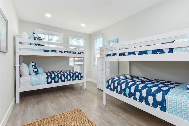 16791 Bayview Dr, Huntington Beach, CA 92649 - bedroom featuring wood finished floors and recessed lighting