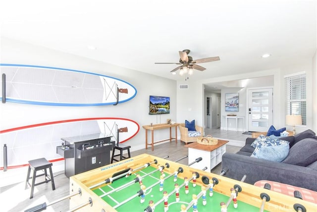 16791 Bayview Dr, Huntington Beach, CA 92649 - recreation room featuring a ceiling fan, wood finished floors, baseboards, and recessed lighting