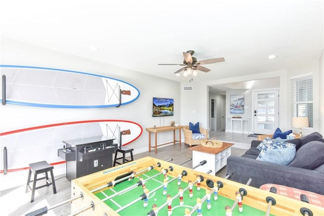 16791 Bayview Dr, Huntington Beach, CA 92649 - game room with ceiling fan, wood finished floors, baseboards, and recessed lighting