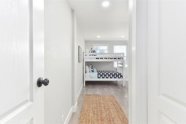 16791 Bayview Dr, Huntington Beach, CA 92649 - hallway with wood finished floors, recessed lighting, and baseboards