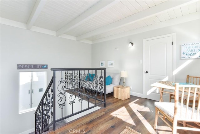 16791 Bayview Dr, Huntington Beach, CA 92649 - staircase with beam ceiling, hardwood / wood-style flooring, and baseboards