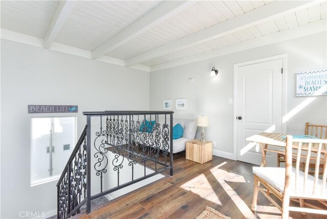 16791 Bayview Dr, Huntington Beach, CA 92649 - staircase with beamed ceiling and wood-type flooring
