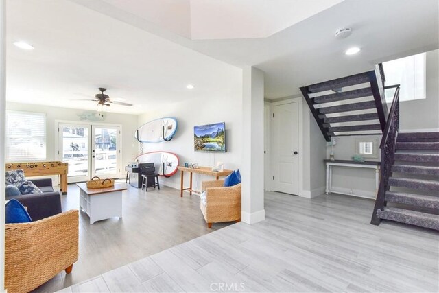 16791 Bayview Dr, Huntington Beach, CA 92649 - living room with stairway, ceiling fan, wood finished floors, recessed lighting, and baseboards