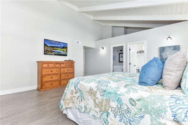 16791 Bayview Dr, Huntington Beach, CA 92649 - bedroom with wood finished floors, baseboards, and ensuite bathroom