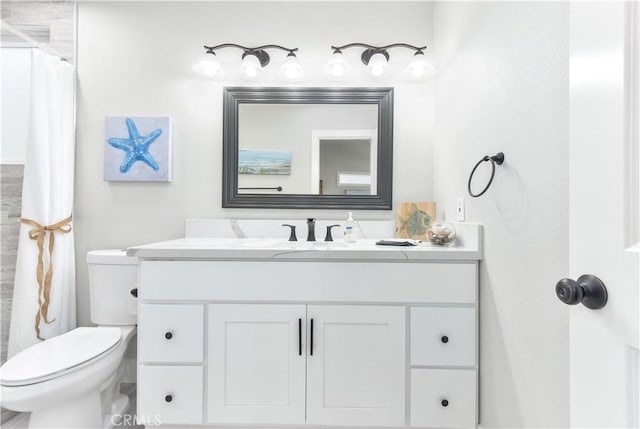 16791 Bayview Dr, Huntington Beach, CA 92649 - bathroom with toilet, vanity, and a shower with curtain