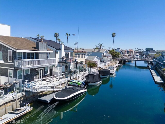 16791 Bayview Dr, Huntington Beach, CA 92649 - dock area featuring a water view