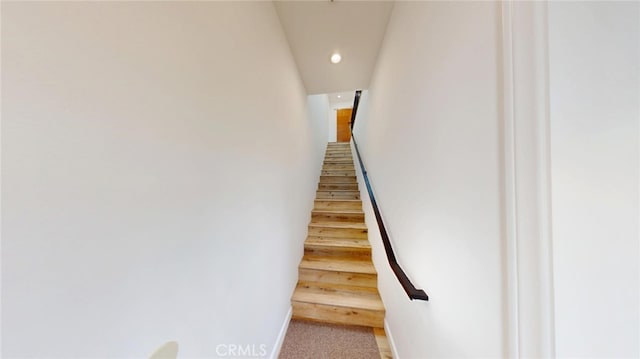 stairway featuring recessed lighting, carpet flooring, and baseboards