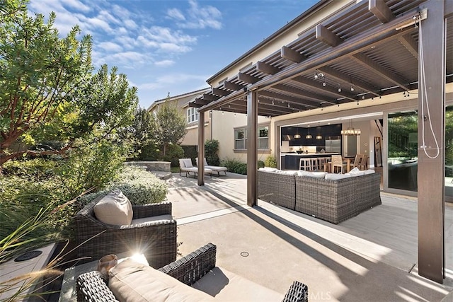 view of patio with a pergola and outdoor lounge area