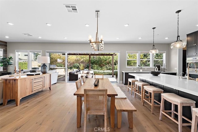 dining room featuring light wood-type flooring