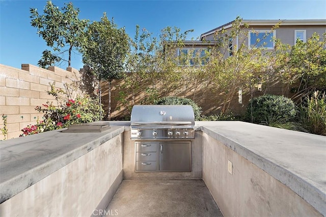 view of patio with area for grilling