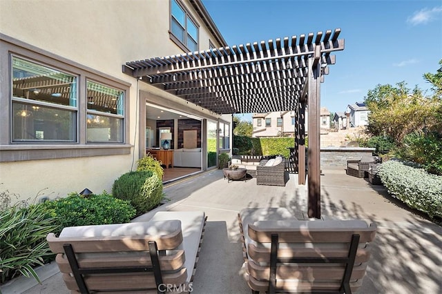 view of patio / terrace featuring a pergola and outdoor lounge area