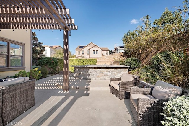 view of patio / terrace featuring a pergola and an outdoor hangout area