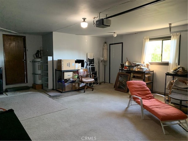 garage with strapped water heater and a garage door opener