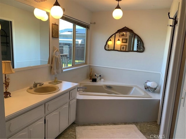 bathroom featuring vanity and a bathtub