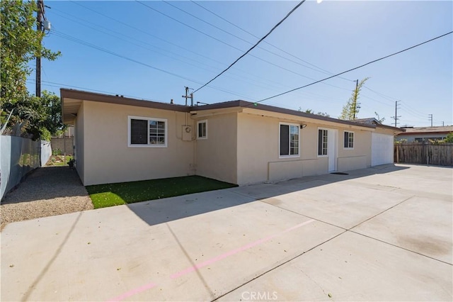 rear view of property with a patio area