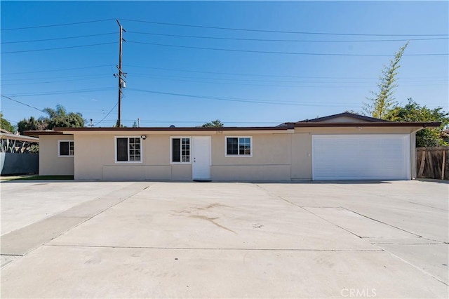 single story home with a garage