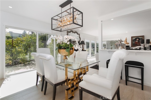 dining space with light wood-type flooring