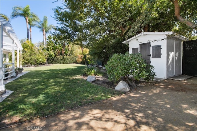 view of yard with a storage shed