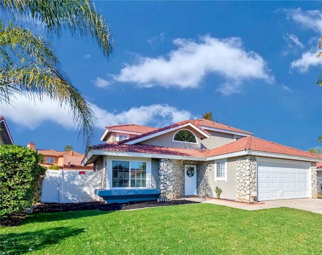 view of front of property with a front yard and a garage