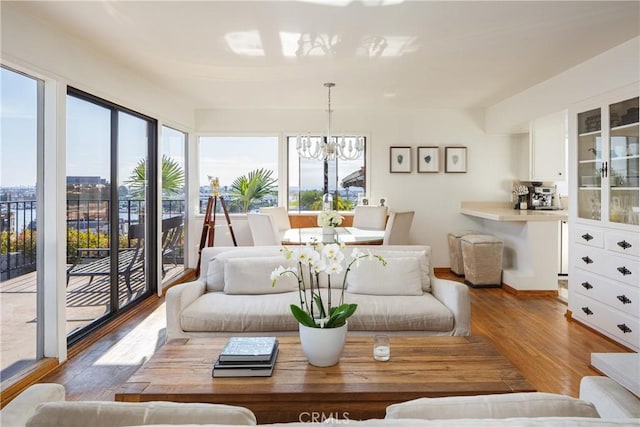 sunroom with a chandelier