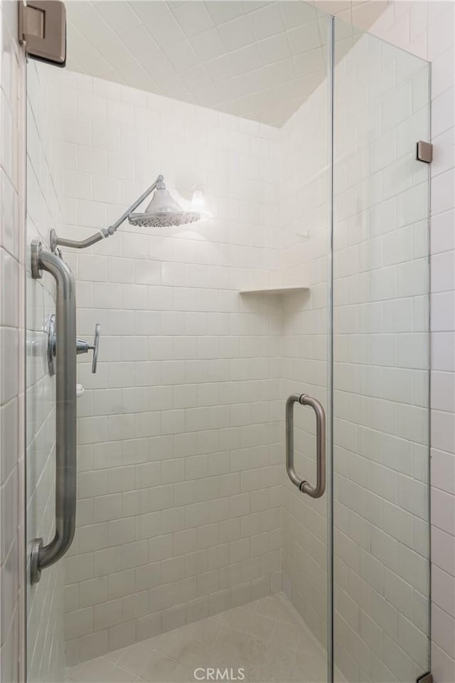 full bathroom with a stall shower