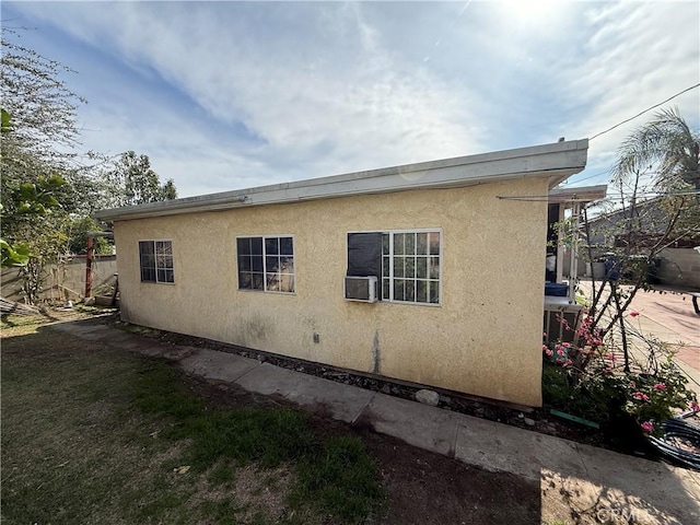 view of property exterior featuring cooling unit