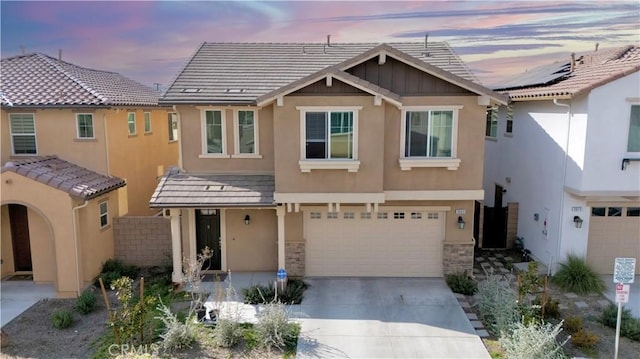 view of front of home featuring a garage