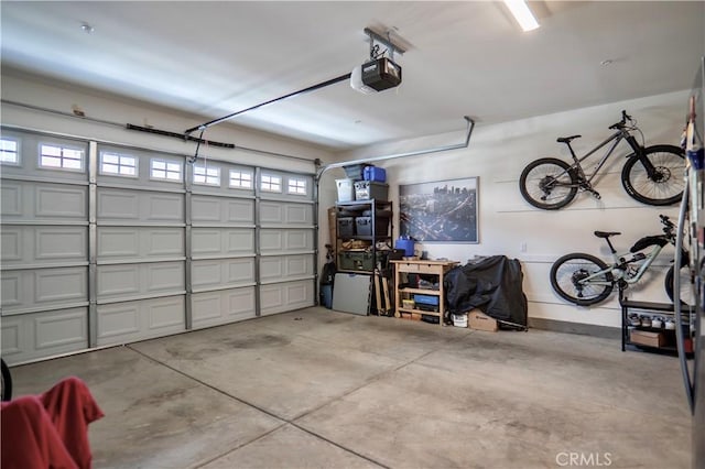 garage featuring a garage door opener