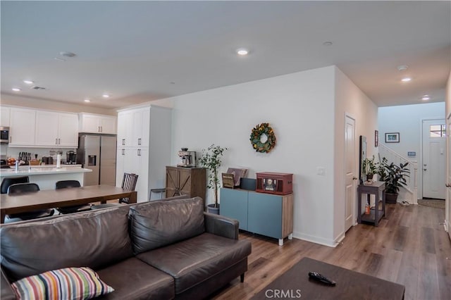 living room featuring light wood-type flooring