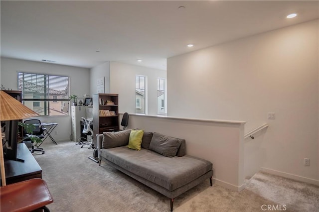 living room with light colored carpet