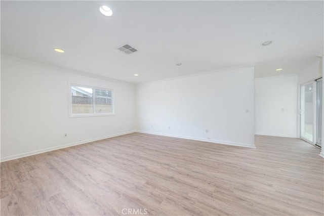 unfurnished room featuring visible vents, recessed lighting, light wood-style flooring, and crown molding