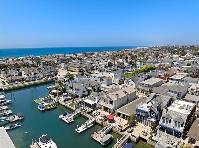 birds eye view of property featuring a residential view and a water view