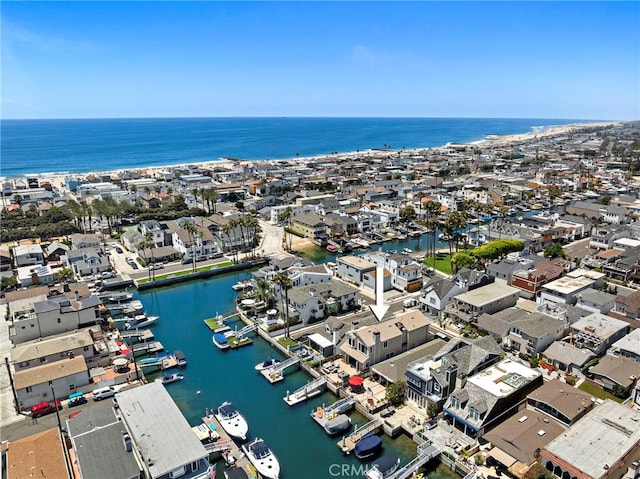 bird's eye view featuring a water view and a residential view