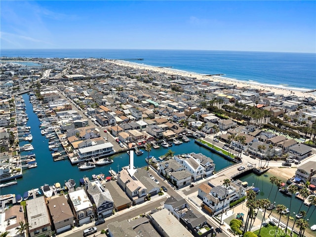 birds eye view of property featuring a residential view and a water view