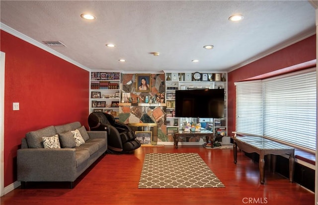 living room featuring ornamental molding and hardwood / wood-style flooring