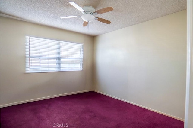 unfurnished room with carpet, ceiling fan, and a textured ceiling