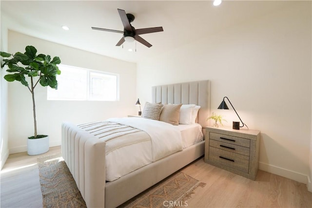 bedroom with recessed lighting, baseboards, a ceiling fan, and light wood finished floors