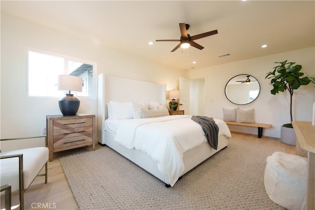 bedroom with recessed lighting, visible vents, light wood-style floors, and a ceiling fan