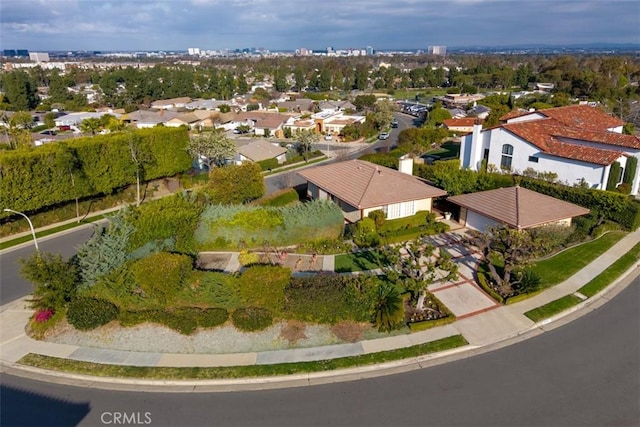 birds eye view of property with a residential view