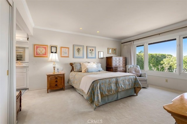 bedroom featuring ornamental molding, light colored carpet, and baseboards